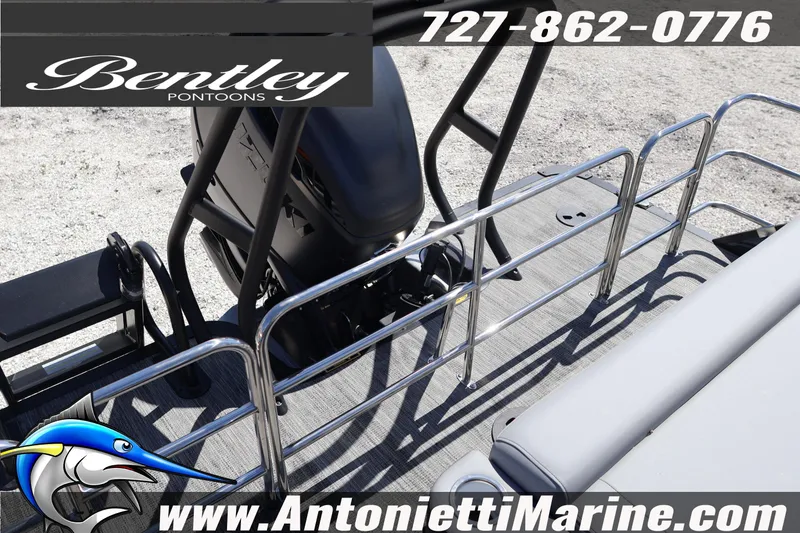 Slide: The Image of 2026 Bentley Pontoons Elite 253 Swingback deck with railing and motor, Antonietti Marine branding. - 35