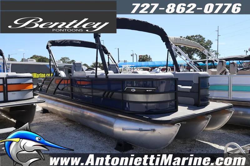 Slide: The Image of 2026 Bentley Pontoons Elite 253 Swingback displayed at Antonietti Marine dealership. - 5