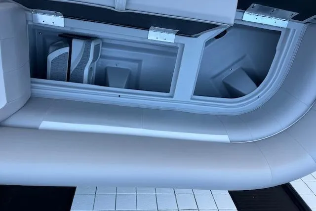 Slide: The Image of Interior view of 2026 Godfrey EX 2286 SFLX boat storage compartment. - 16