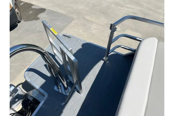 Slide: The Image of Rear deck of 2026 Godfrey EX 2286 SFLX pontoon boat with metal railing. - 19