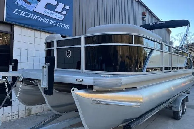 Slide: The Image of 2026 Godfrey EX 2286 SFLX pontoon boat on trailer at CIC Marine dealership. - 4
