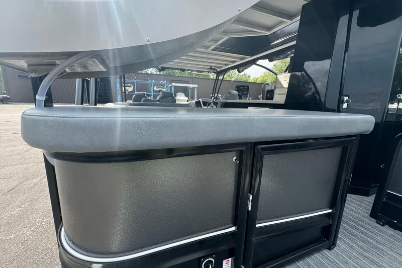 Slide: The Image of 2026 Premier Escalante boat interior with sleek bar and seating area. - 10
