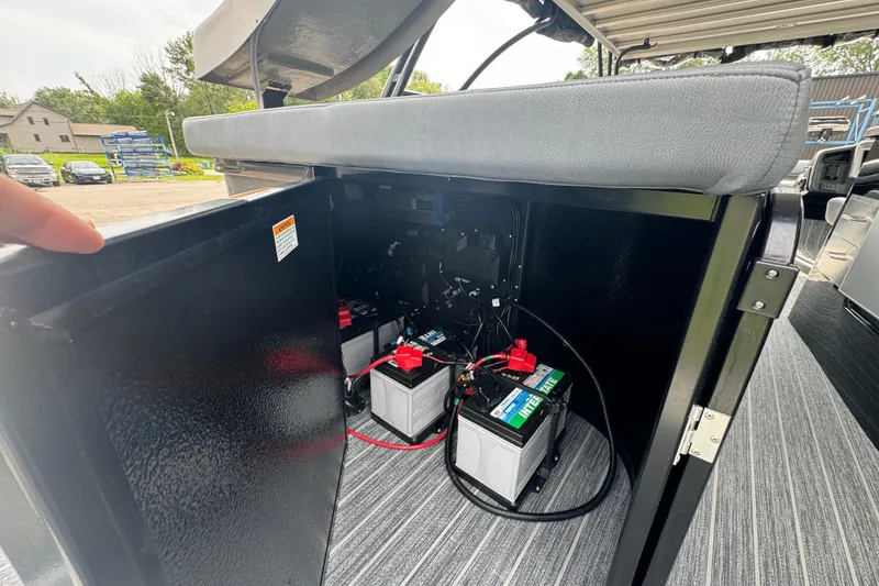 Slide: The Image of 2026 Premier Escalante battery compartment with two batteries and wiring. - 11