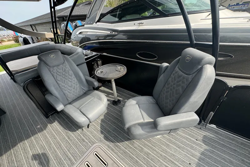 Slide: The Image of Luxurious seating on 2026 Premier Escalante boat with elegant gray upholstery and sleek design. - 14