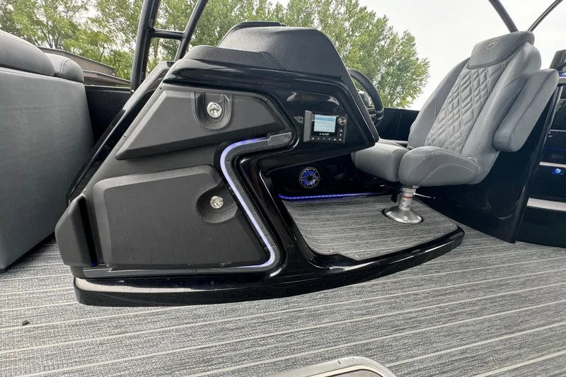 Slide: The Image of 2026 Premier Escalante boat interior with modern dashboard and luxurious seating. - 24