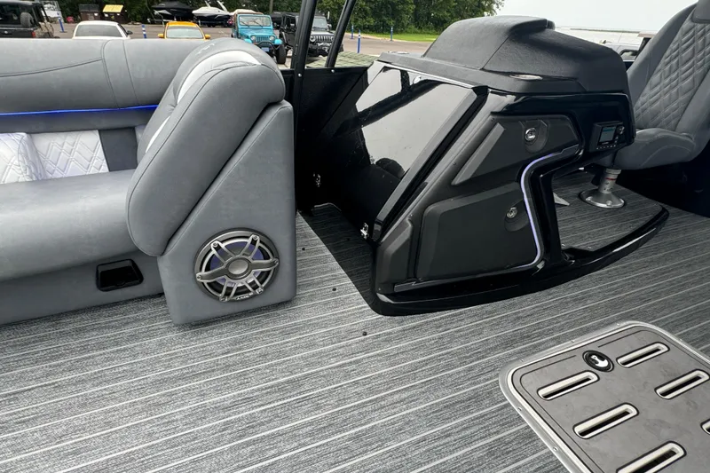 Slide: The Image of Interior of 2026 Premier Escalante boat with modern seating and speaker system. - 35