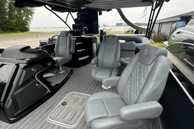 Slide: The Image of Luxurious interior of 2026 Premier Escalante boat with plush seating and modern design. - 36