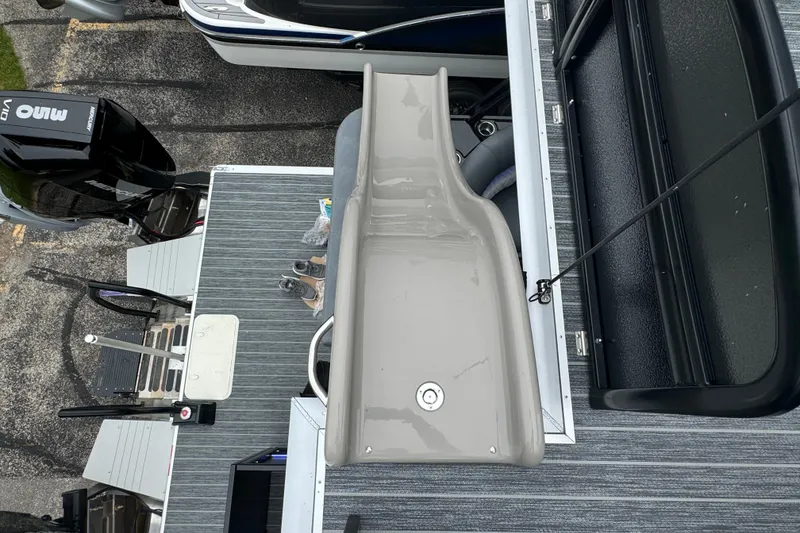 Slide: The Image of Top view of a 2026 Premier Escalante boat with a slide and motor. - 37