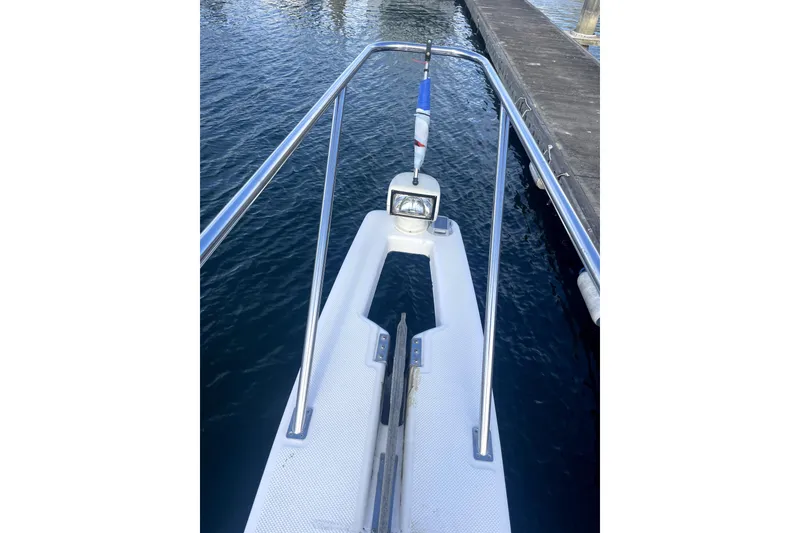 Slide: The Image of Bow view of 2001 Bayliner 3988 Command Bridge Motoryacht at dock. - 38