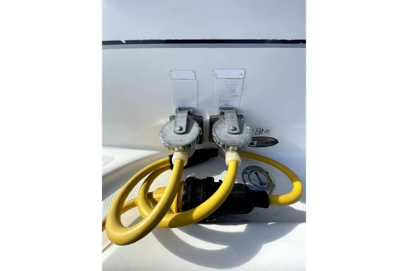 Slide: The Image of Yellow hoses connected to a 2001 Bayliner 3988 Command Bridge Motoryacht. - 41