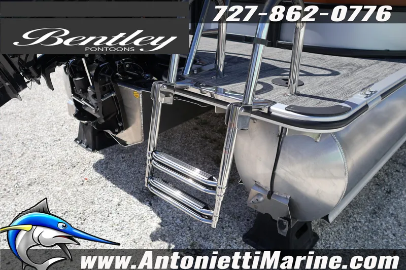 Slide: The Image of 2026 Bentley Pontoons Bolt 223 with ladder and motor, displayed at Antonietti Marine. - 12