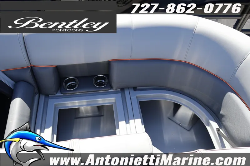 Slide: The Image of 2026 Bentley Pontoons Bolt 223 interior seating with cup holders, showcased by Antonietti Marine. - 17