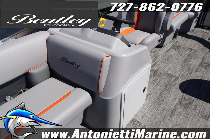 Slide: The Image of 2026 Bentley Pontoons Bolt 223 interior with gray and orange seating, Antonietti Marine branding. - 18