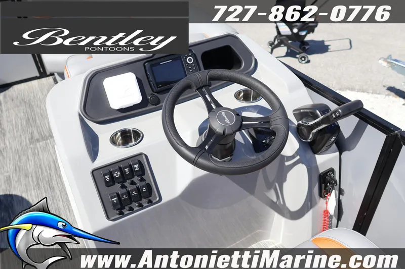 Slide: The Image of Steering console of 2026 Bentley Pontoons Bolt 223 with controls and branding. - 22
