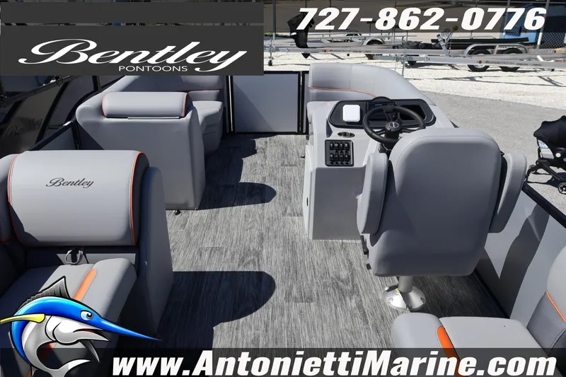 Slide: The Image of 2026 Bentley Pontoons Bolt 223 interior with gray seating and steering console. - 28
