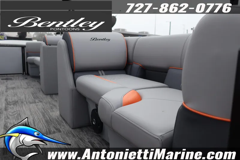 Slide: The Image of 2026 Bentley Pontoons Bolt 223 interior with gray and orange seating, Antonietti Marine branding. - 3