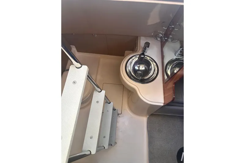 Slide: The Image of Interior of 2007 Azimut 55E yacht showing compact sink and stairs. - 13