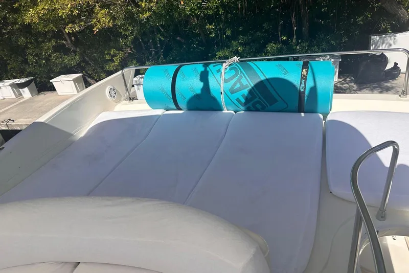 Slide: The Image of Sunbathing deck on 2007 Azimut 55E yacht with rolled-up blue mat. - 28