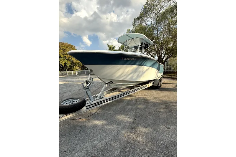 Slide: The Image of 2008 Sea Fox 256 Center Console boat on trailer, parked outdoors. - 12
