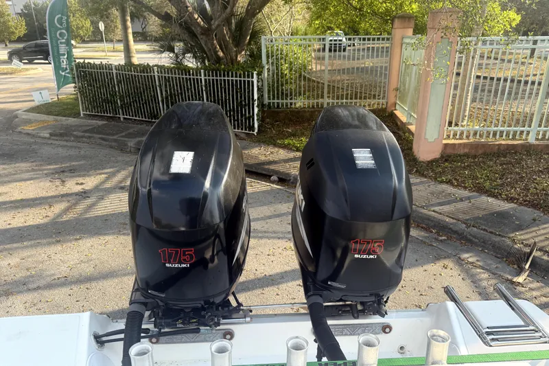 Slide: The Image of Twin Suzuki 175 outboard engines on a 2008 Sea Fox 256 Center Console boat. - 2