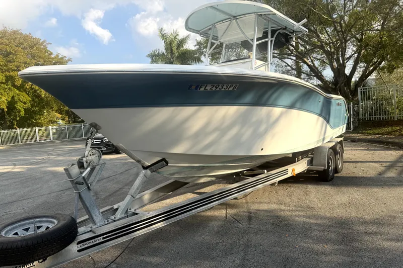 Slide: The Image of 2008 Sea Fox 256 Center Console boat on trailer, parked outdoors. - 3
