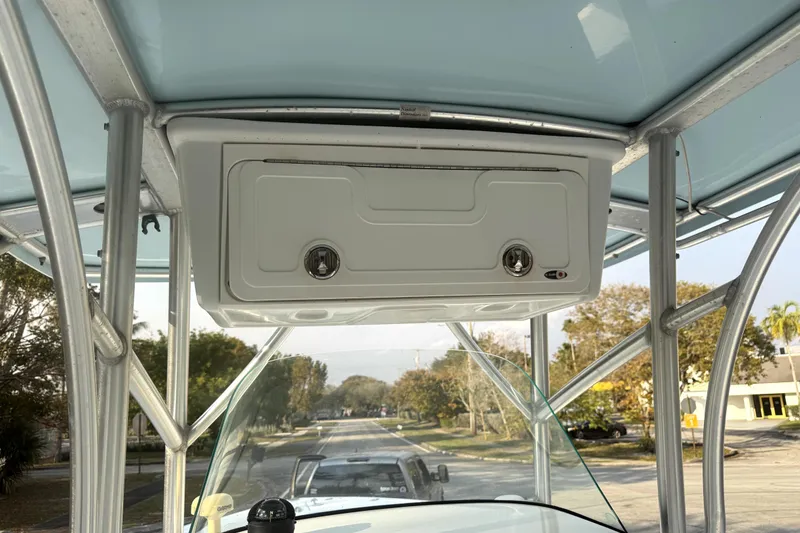 Slide: The Image of 2008 Sea Fox 256 Center Console boat with overhead storage compartment. - 6