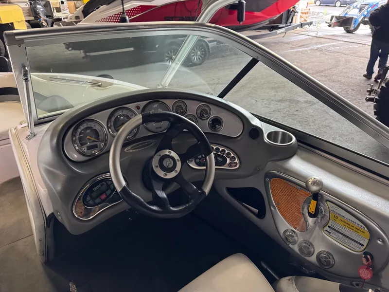 Slide: The Image of Interior view of a 2006 Correct Craft Air Nautique 210 boat. - 10