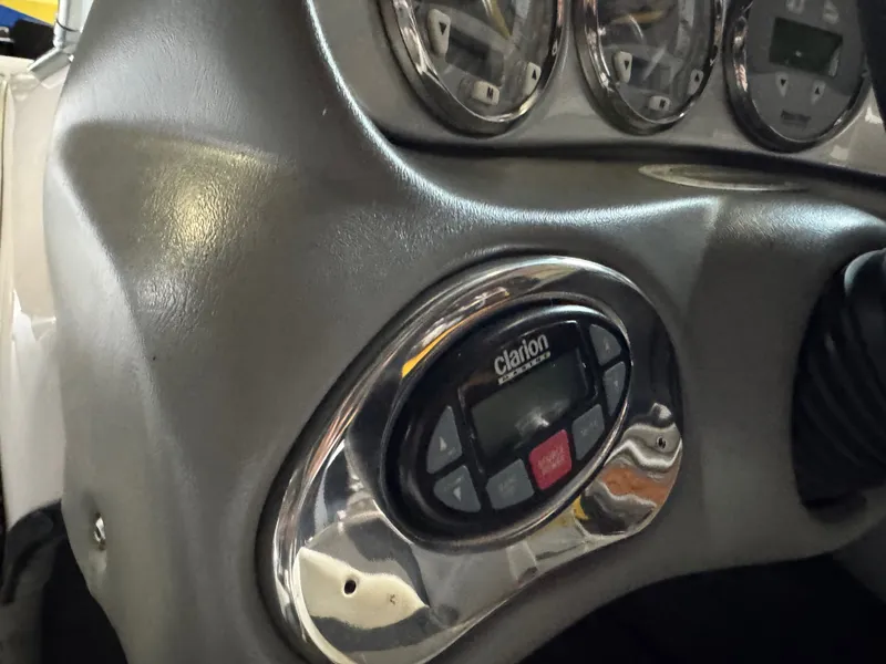 Slide: The Image of Dashboard of a 2006 Correct Craft Air Nautique 210 with Clarion control. - 12