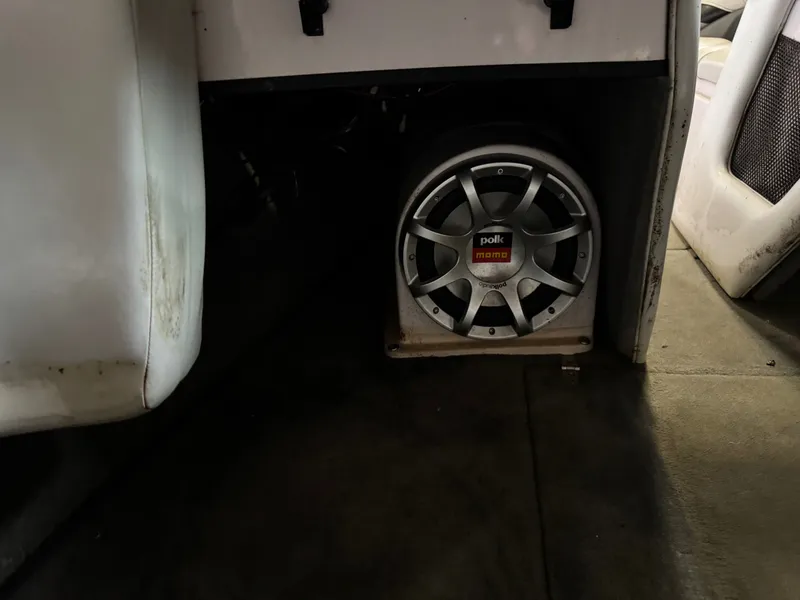 Slide: The Image of Polk Audio speaker in a 2006 Correct Craft Air Nautique 210 boat. - 15