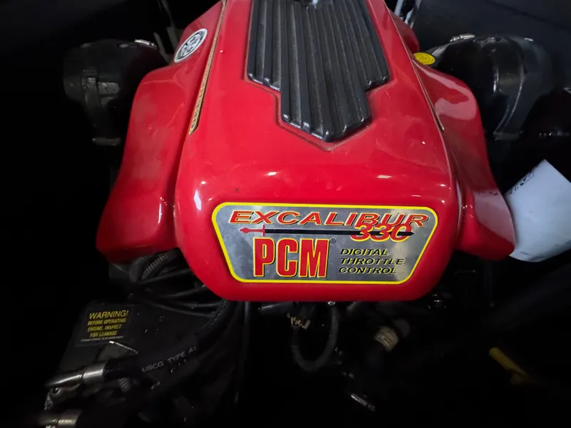 Slide: The Image of Excalibur 330 PCM engine in 2006 Correct Craft Air Nautique 210. - 25