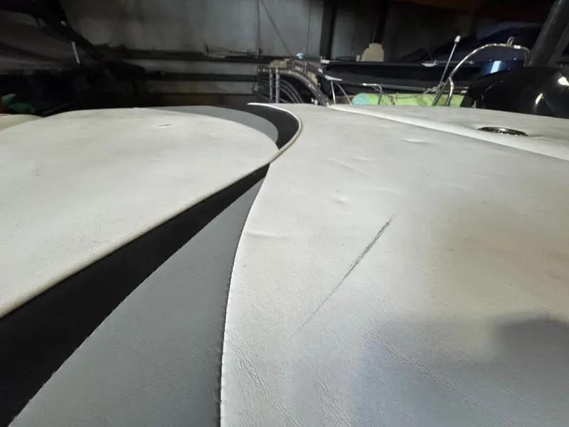 Slide: The Image of Close-up of seat upholstery on a 2006 Correct Craft Air Nautique 210. - 30