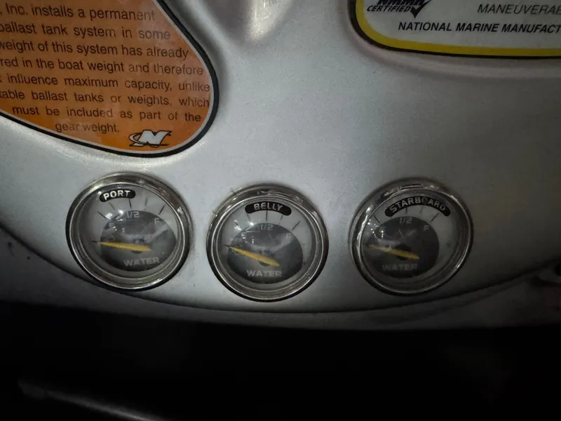 Slide: The Image of Ballast gauges of the 2006 Correct Craft Air Nautique 210. - 38