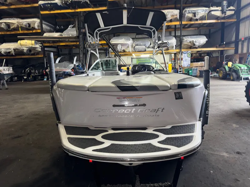 Slide: The Image of 2006 Correct Craft Air Nautique 210 in warehouse. - 5