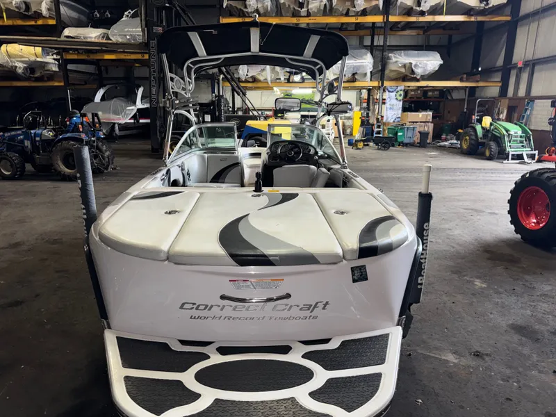 Slide: The Image of 2006 Correct Craft Air Nautique 210 in warehouse. - 6