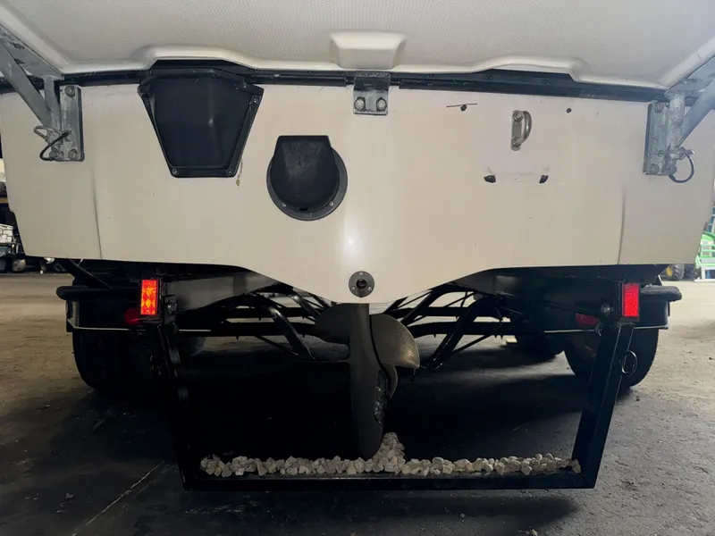 Slide: The Image of Rear view of a 2006 Correct Craft Air Nautique 210 boat. - 39