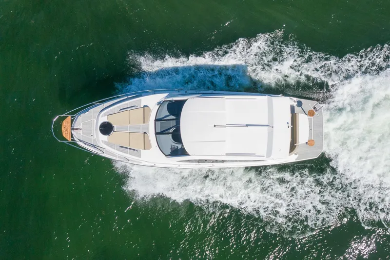 Slide: The Image of Aerial view of 2026 Hanover 375 yacht cruising on open water. - 14