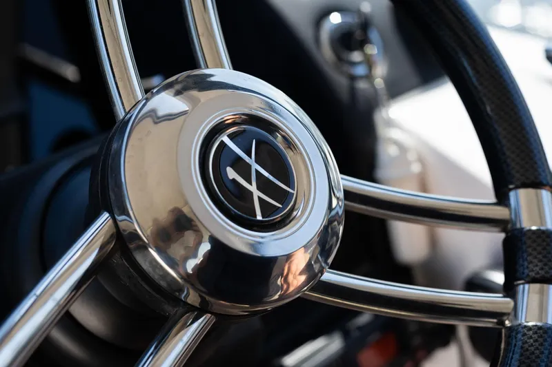 Slide: The Image of Close-up of Hanover 375 steering wheel, 2026 model, featuring sleek chrome design. - 45