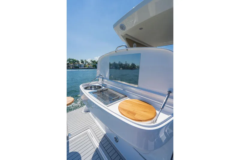 Slide: The Image of Outdoor kitchen on Hanover 375 yacht, featuring sink and grill, 2026 model. - 59