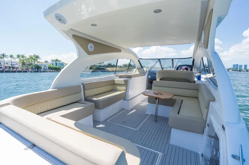 Slide: The Image of Luxurious 2026 Hanover 375 yacht interior with elegant seating and scenic waterfront view. - 60