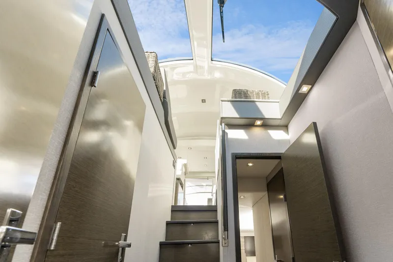 Slide: The Image of Interior view of 2018 Cruisers Yachts 50 Cantius, showcasing modern design and open skylight. - 29