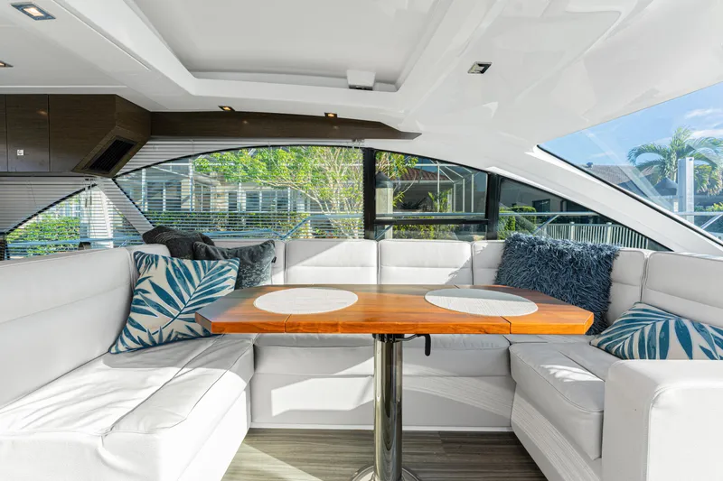 Slide: The Image of Luxurious interior of 2018 Cruisers Yachts 50 Cantius with elegant seating and table. - 39