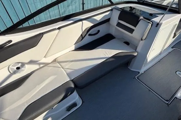 Slide: The Image of 2021 Yamaha Boats AR210 interior with sleek seating and modern design. - 22