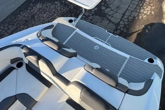 Slide: The Image of 2021 Yamaha Boats AR210 interior with sleek seating and modern design. - 31