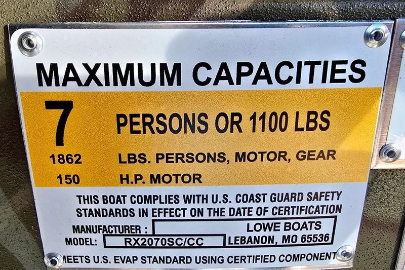 Slide: The Image of 2026 Lowe Roughneck RX2070 SC capacity plate: 7 persons or 1100 lbs, 150 HP motor. - 11