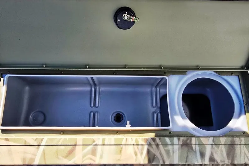 Slide: The Image of 2026 Lowe Roughneck RX2070 SC boat storage compartments, open view. - 4