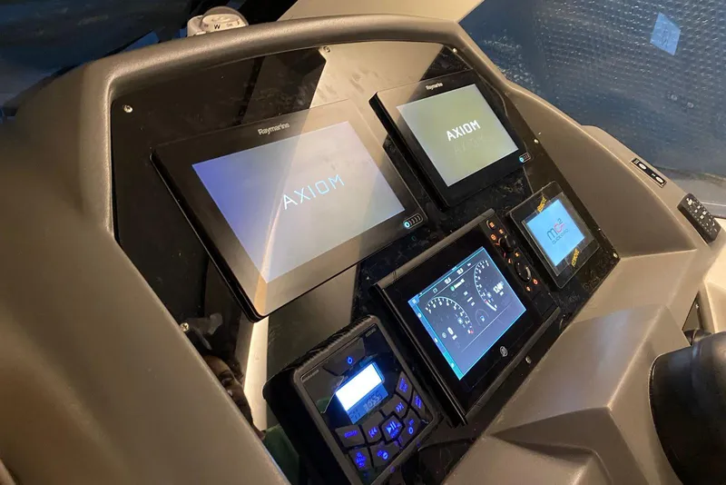 Slide: The Image of Control panel of 2026 Hanover 375 with multiple digital displays and navigation systems. - 8