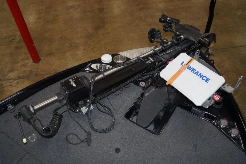 Slide: The Image of 2020 Bass Cat Lynx boat with Lowrance equipment and trolling motor setup. - 16