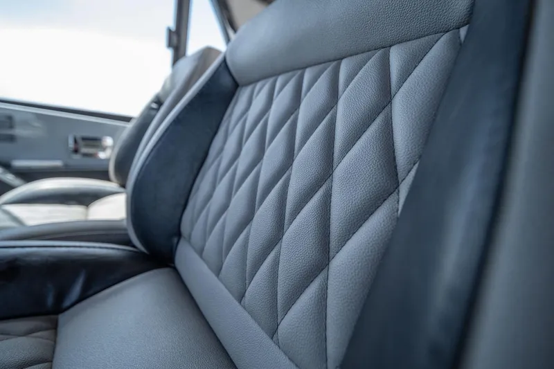 Slide: The Image of Luxurious quilted leather interior of 2026 Hanover 387 vehicle. - 17