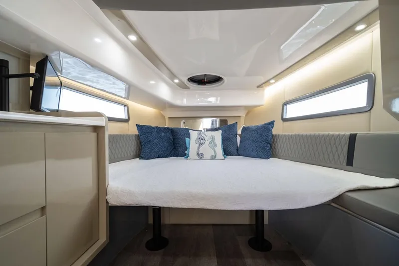 Slide: The Image of Luxurious interior of 2026 Hanover 387 boat with cozy bed and elegant decor. - 19