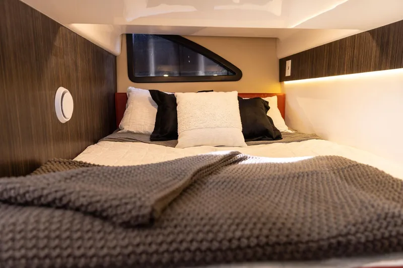 Slide: The Image of Cozy interior of 2026 Hanover 387 with plush bedding and modern design. - 16